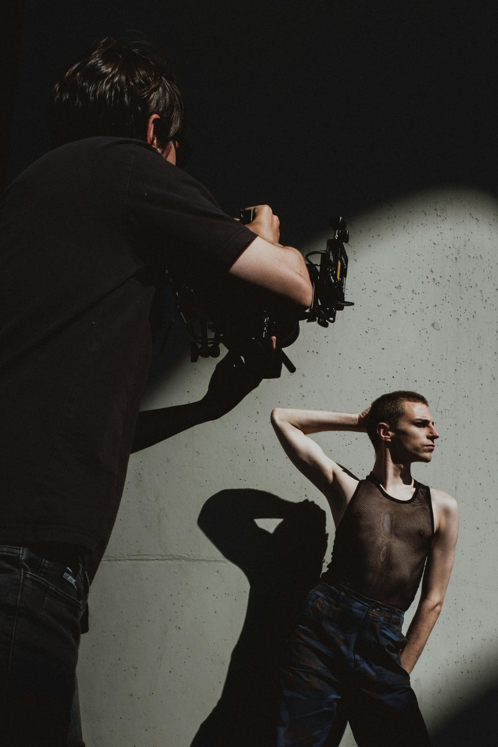 crowd looking at a lighted stage